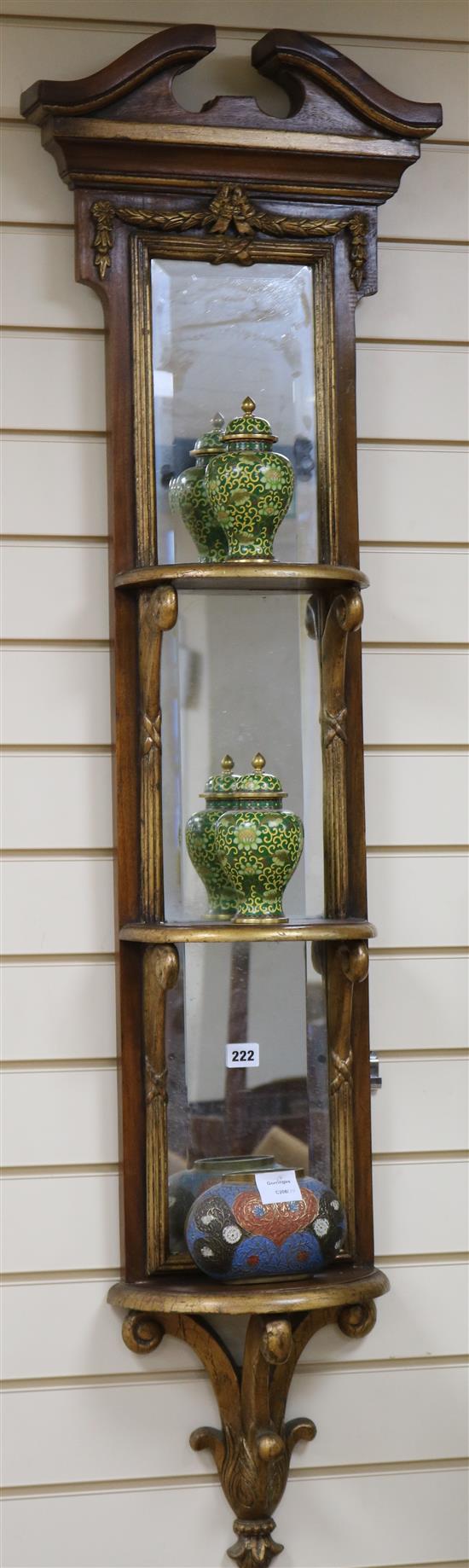 A narrow mirrored giltwood three tier wall bracket, a pair of lidded cloisonne vases and a painted metal vase